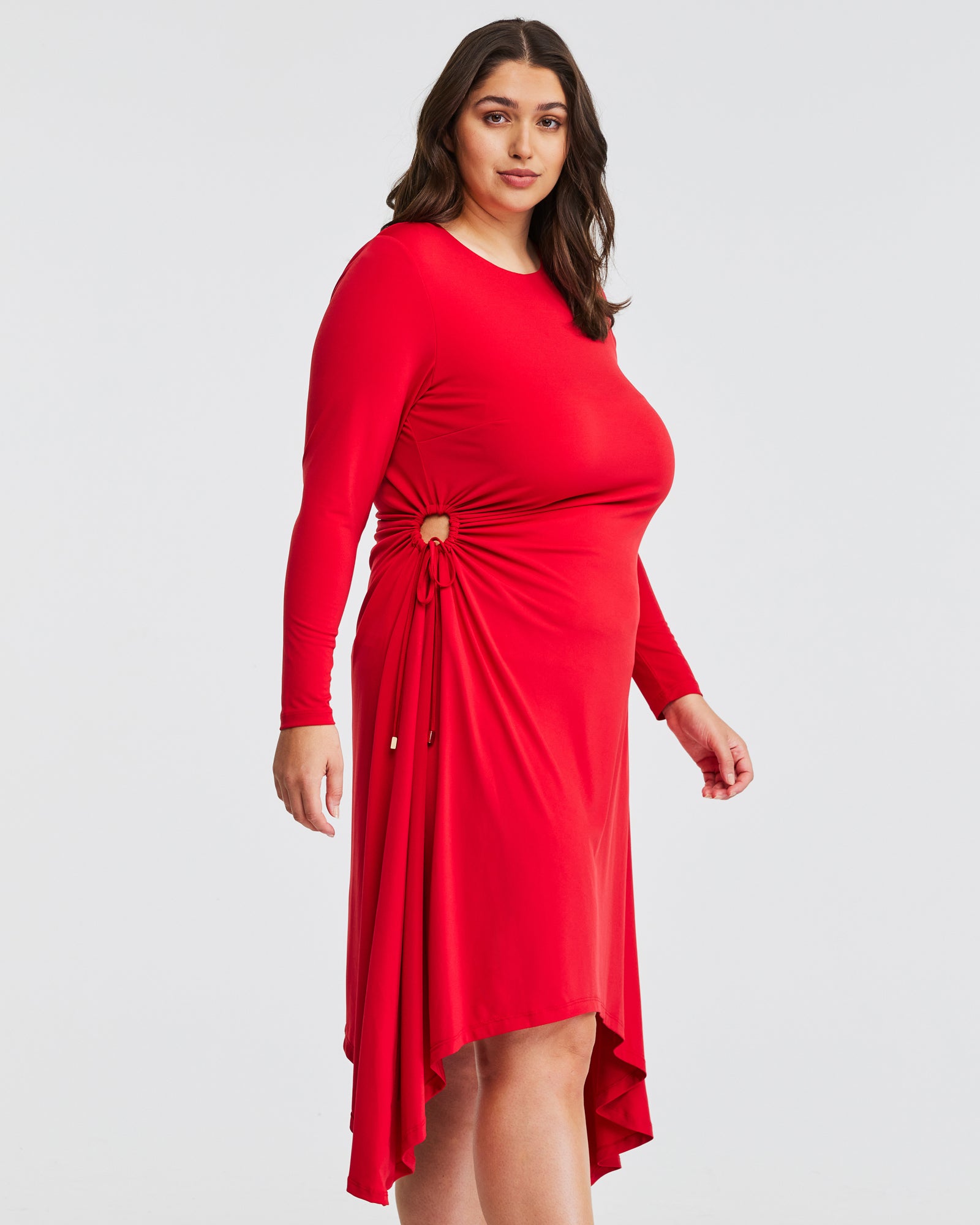 A plus size woman wearing a red Jersey Ruched Dress.