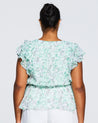 The back view of a woman wearing the Estelle Green Prairie Top.