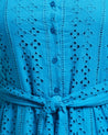 A close up of a woman in an Estelle Isle Dress.