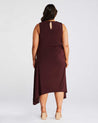 The back view of a woman wearing an Estelle-us Yvette Dress.