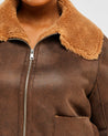 Close up of fuzzy collar and zip on Womens Lenny Jacket in Chocolate & Tan by Estelle Clothing