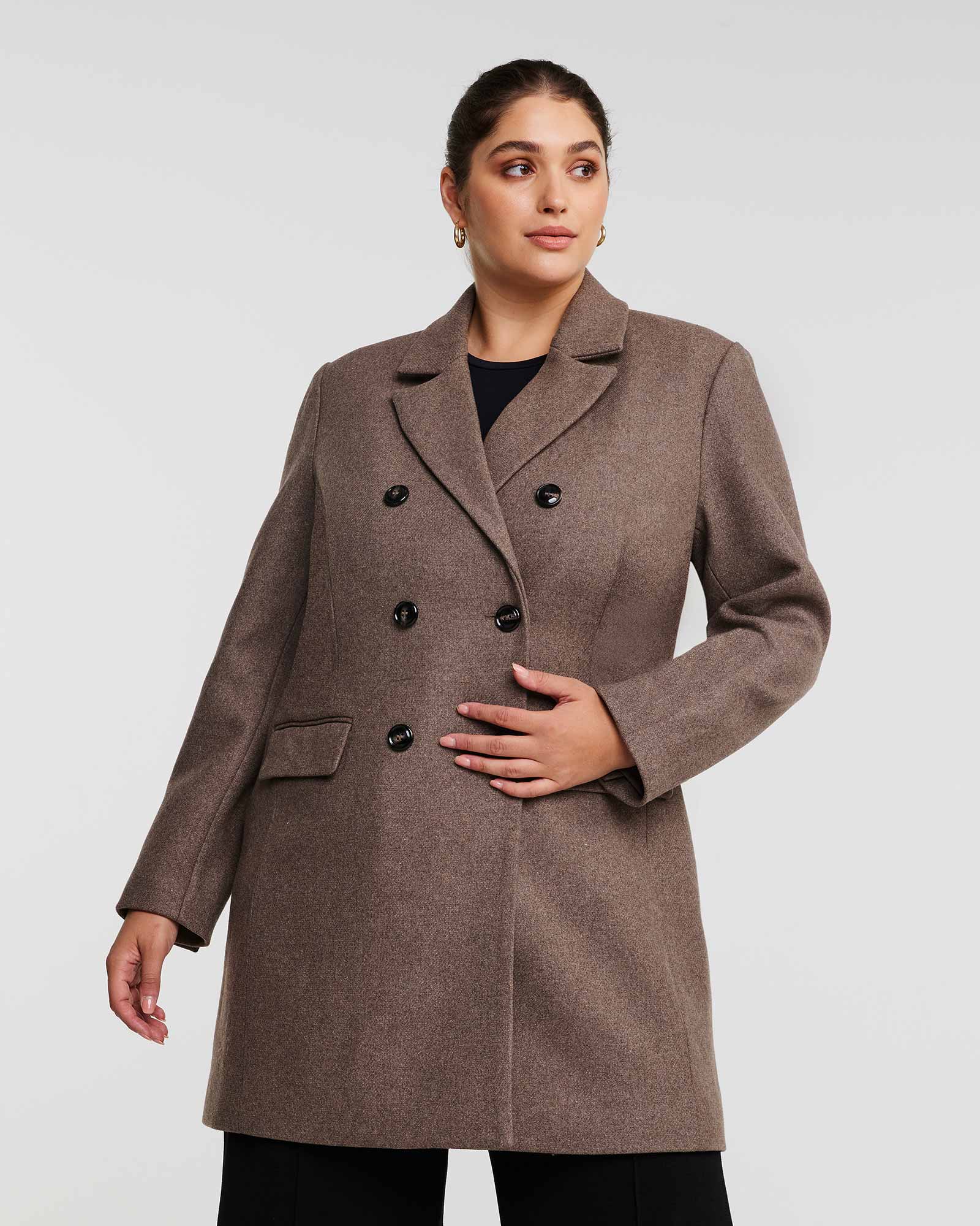 A plus-size woman wearing a Redford Mocha Brown Double-Breasted Coat.