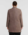 The back view of a Redford Mocha Brown Double-Breasted Coat on a plus-size woman.