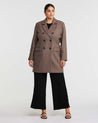 A Redford Mocha Brown Double-Breasted Coat worn by a plus-size woman.