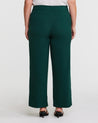 The back view of a woman wearing Estelle Nightlife Green Wide Leg Pant.