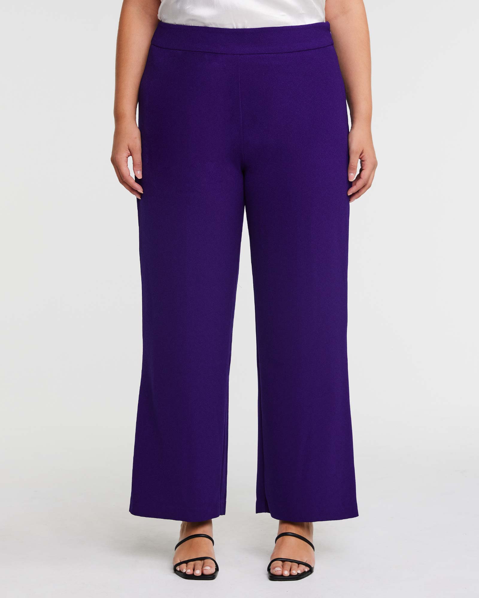 A woman wearing the Nightlife Purple Wide Leg Pant.